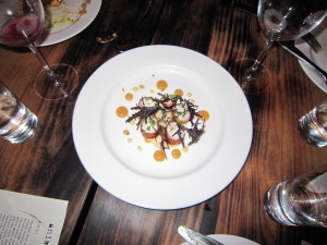 Rabbit loin with parsnip, pear mostarda and Benton's bacon