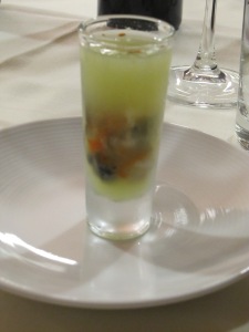 Oyster shooter with cucumber juice and a dash of Siracha sauce.